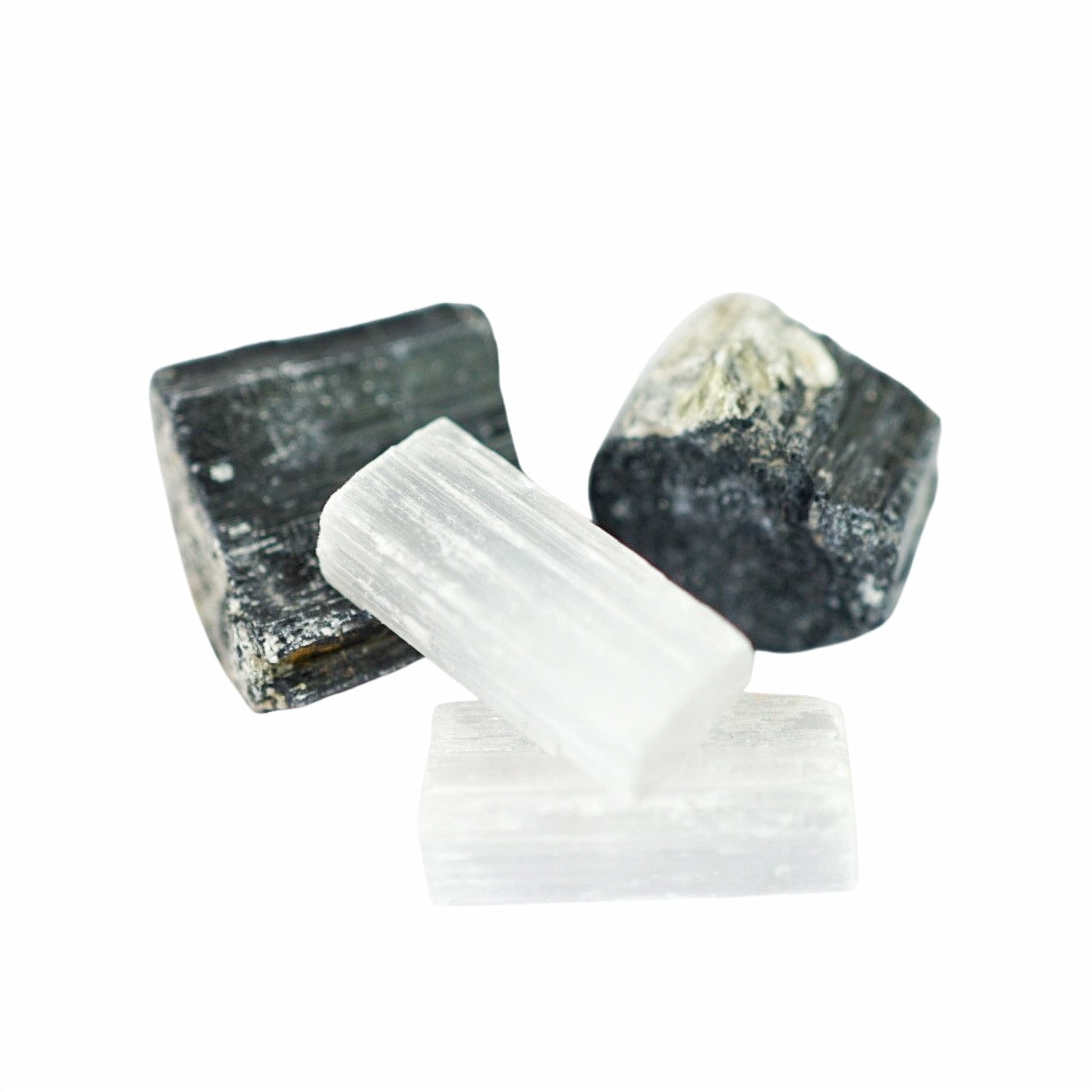A set of Black Tourmaline and Selenite crystals designed to shield against negativity and promote a peaceful home environment