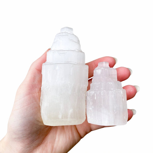 Hand-carved Selenite Towers with a translucent glow, perfect for energy cleansing, meditation and spiritual connection.