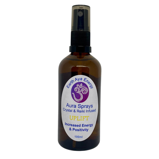 Handcrafted Uplift Aura Spray in a stylish amber bottle, perfect for aura cleansing and mood enhancement.