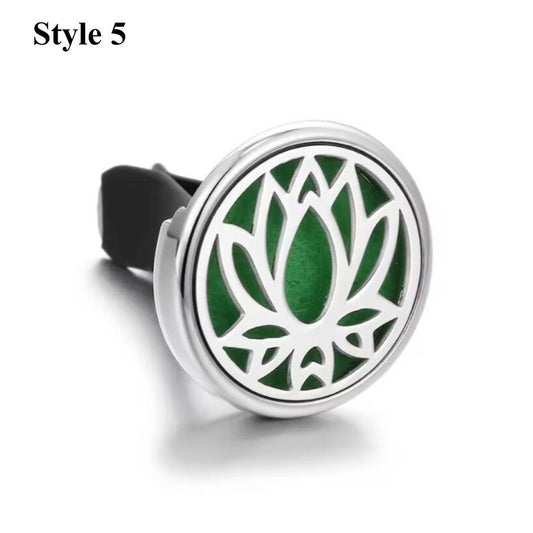 Lotus aromatherapy car diffuser in silver, designed with a geometric pattern to diffuse essential oils in your car.