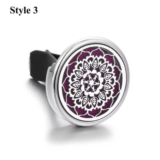 Mandala aromatherapy car diffuser in silver, designed with a geometric pattern to diffuse essential oils in your car.