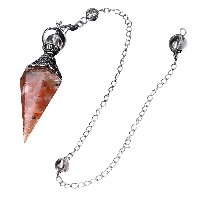 Red Agate Orgonite Pendulum with full chain laid out, used for divination and energy work