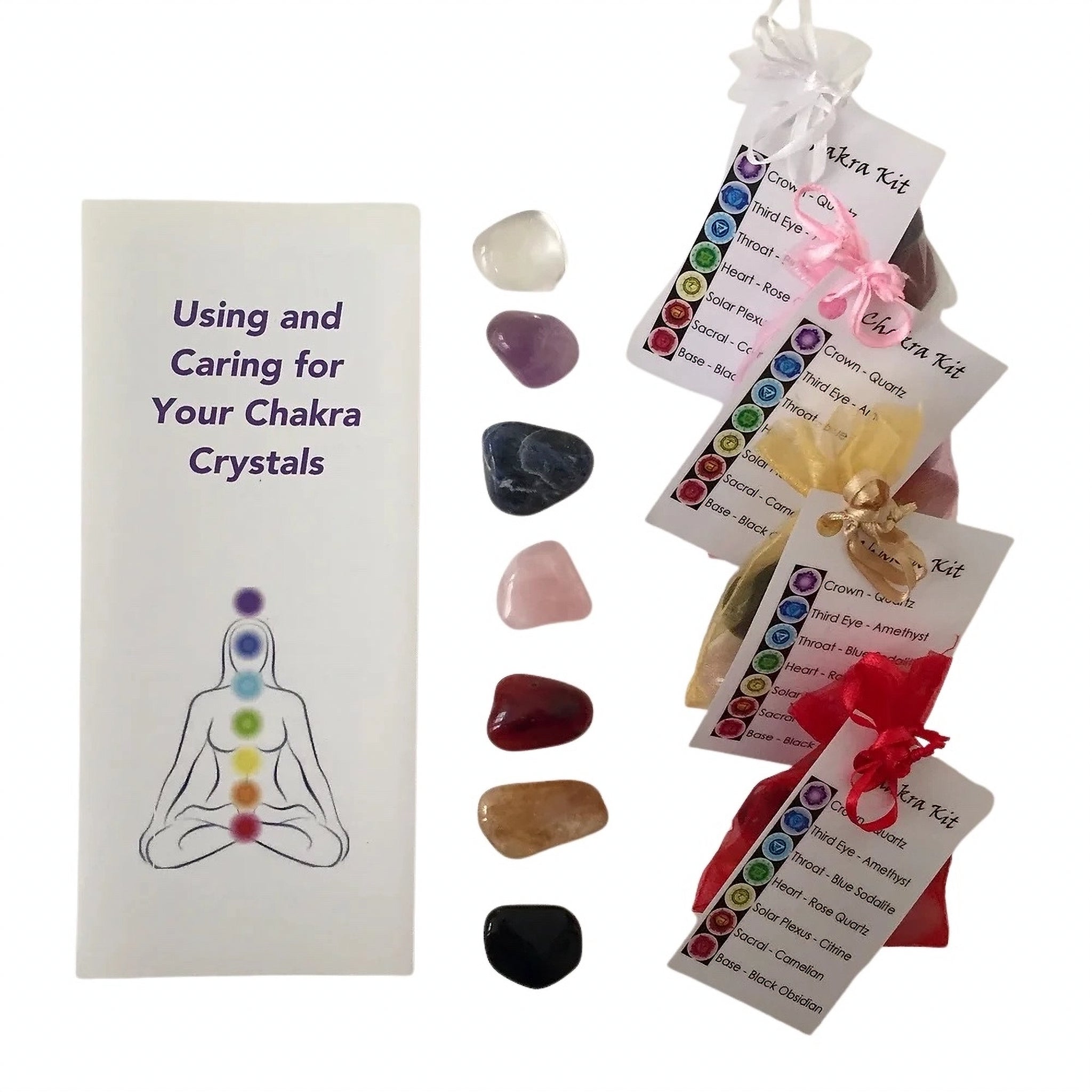 Set of 7 chakra tumbled stones with an instruction booklet and organza bag for meditation and healing.