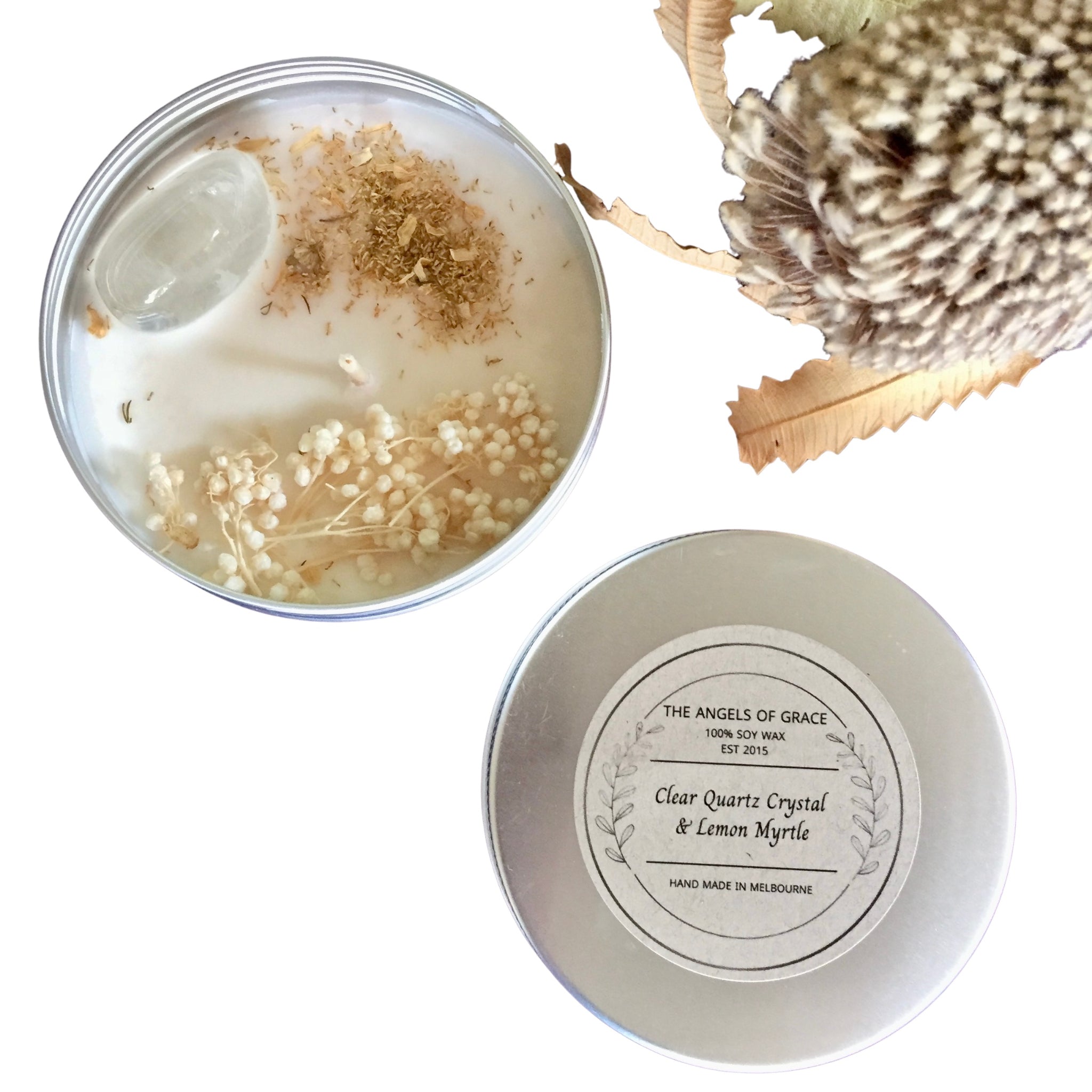 Soy wax crystal candle with lemon myrtle fragrance, topped with a Clear Quartz crystal and dried flowers.