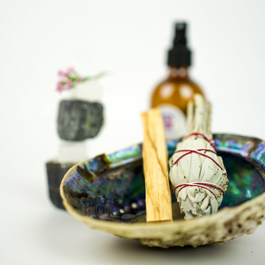 Spiritual cleansing and protection kit featuring a smudge kit, black tourmaline, selenite crystals, and Protection Sage Spray