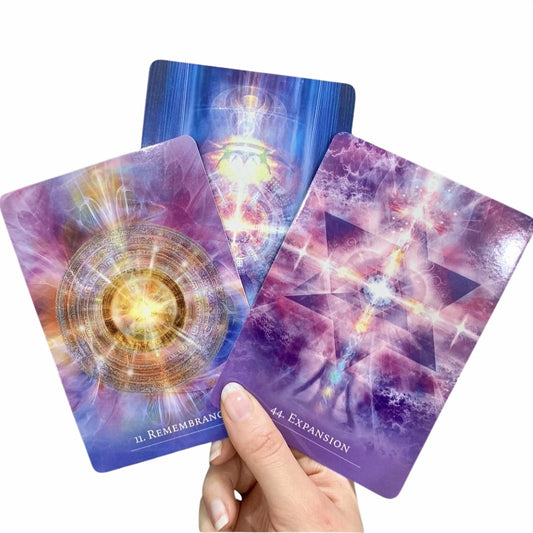 The Secret Language of Light Oracle Cards displaying luminous light-coded artwork and intuitive messages.